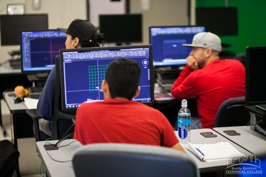 Three CAD-BIM Students Working on Computers in Class in Denver, CO