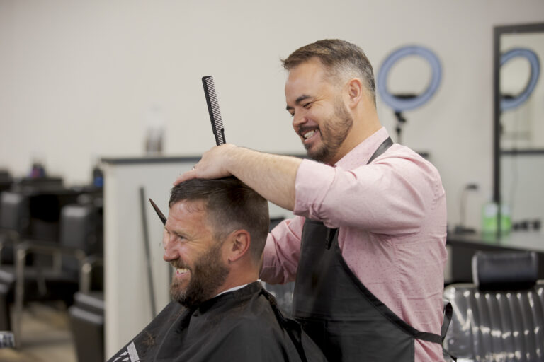 Barbering Student Performing Haircut in Denver, CO