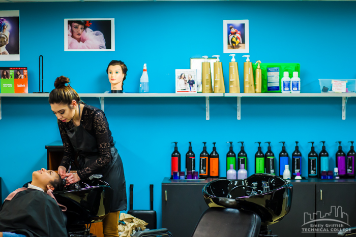 Female Cosmetology Student Washing Client's Hair in Emily's Salon in Denver, CO