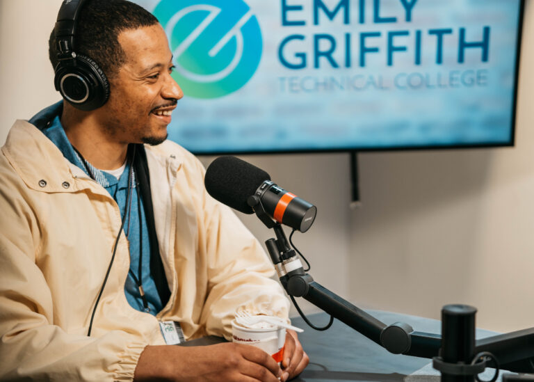 Multimedia and Video Production Student Smiles While Recording for Video Podcast in Denver, CO