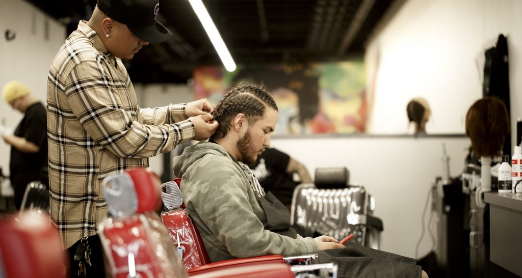 Barbering Student Performing Haircut in Denver, CO