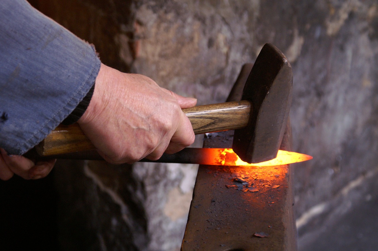 Stock image - forging metal/steel with mallet