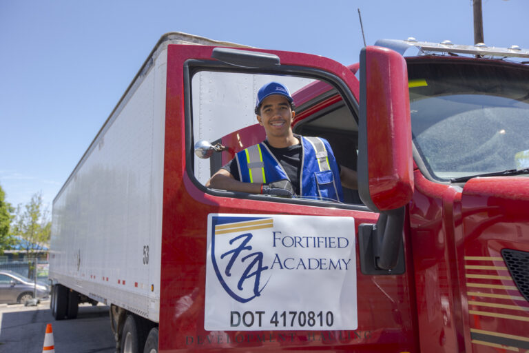 Commercial Truck Driver Apprentice in semi-truck