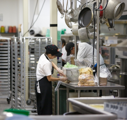 School Food Specialist Apprentices working in industrial kitchen