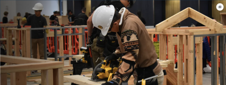 Students and apprentices practicing carpentry skills