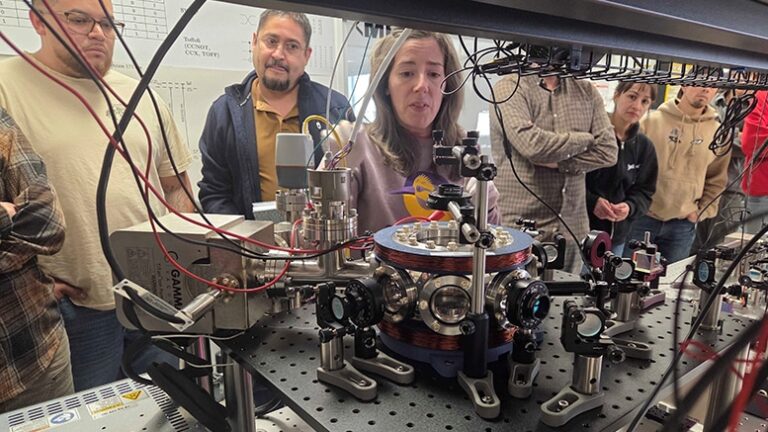 Central New Mexico Community College students work with Sandia National Labs quantum scientist Dr. Megan Ivory to create a magneto-optical trap.